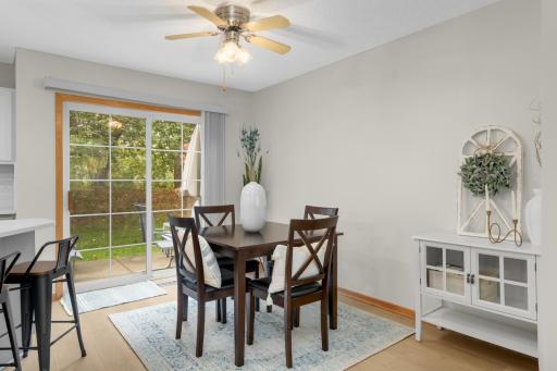 Spacious dining room with sliding door out to great backyard.