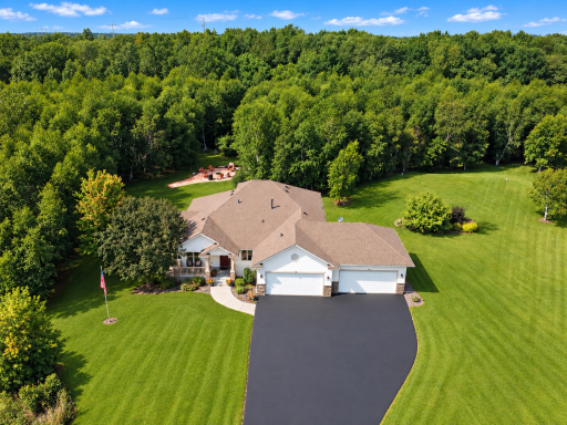 Over Head of Home with Flagstone Fire Pit