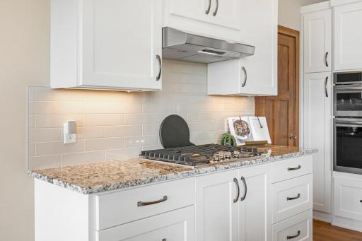 Bring out your inner chef with a gas cooktop, generous prep space, beautiful granite surfaces, and everything you need to make weeknight dinners or weekend entertaining a breeze.