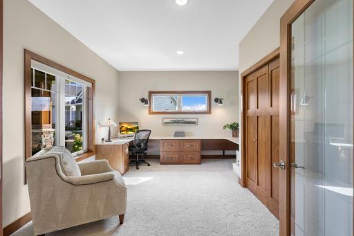 Conveniently located just off the entry, the spacious main-level office features abundant natural light and custom built-in workspaceâperfect for working from home.