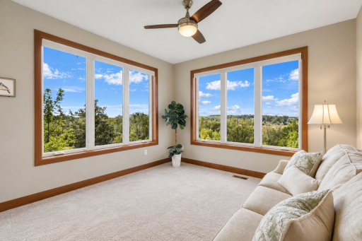 An ideal mother-in-law or guest suite with incredible views, abundant natural light, and a full bath conveniently located just steps away.