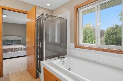 This primary ensuite offers both a soaking tub and a glass walled shower, everything a buyer wants in a spa like retreat just steps from the bedroom.