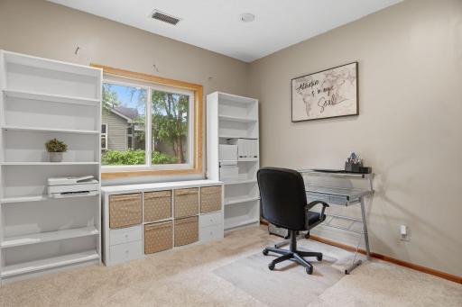 This home office offers generous built in storage on both sides of the window seat, the flexible space buyers are searching for in today's market.