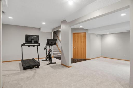 This wide open lower level connects straight to the stairwell, ready to flex as a rec room, home gym, or media space depending on your family's needs.