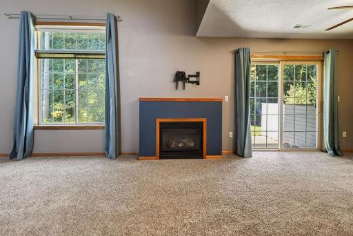 Gas Fireplace and a view of your private patio