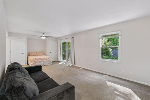 living room space connects to the bedroom space - perfect crash pad and efficiency living with walkout sliding doors