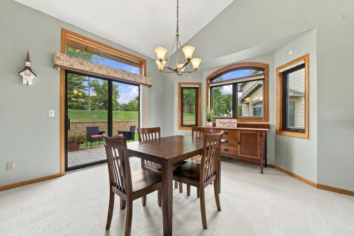 A lovely backdrop of the patio and peaceful views from your dining area