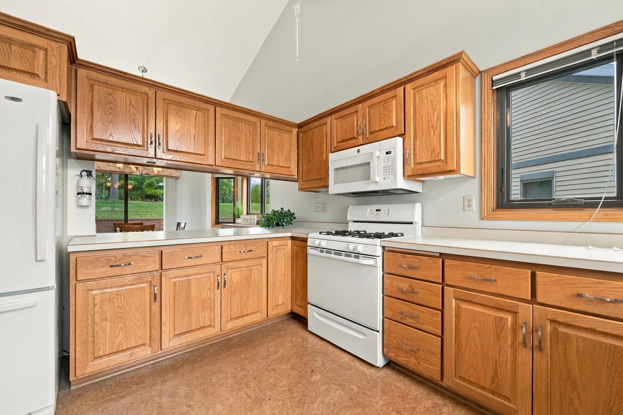 Solid wood cabinets and so much counterspace for cooking and baking