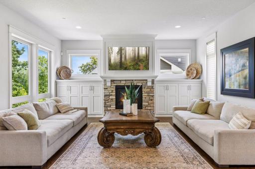 Inviting great room with stone fireplace.