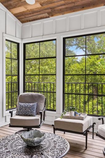 Peaceful screened porch overlooking the trees.