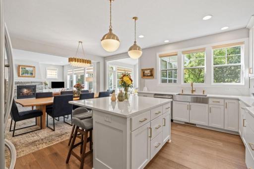 Generously sized kitchen with abundant cabinetry, workspace and room to gather.