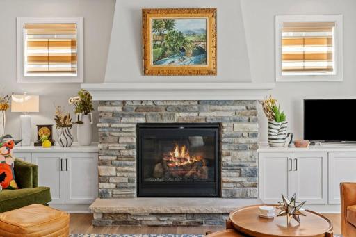 Cozy fireplace with handsome built-ins.