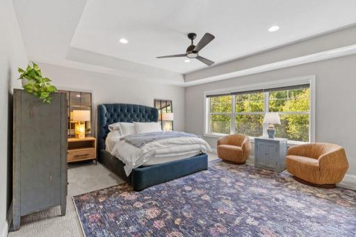 Primary Bedroom — Spacious primary retreat offering plenty of room to unwind at the end of the day.