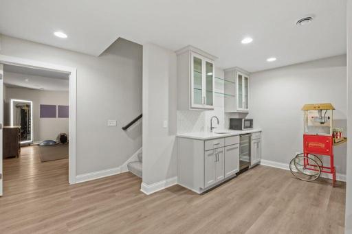 Custom built-in wet bar in lower level.