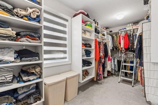 Larger primary walk-in closet.