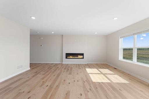 Family Room - with fireplace. Not actual but similar floorplan.