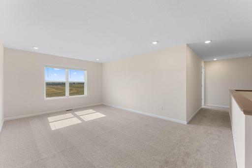 Upstairs loft, spacious! Not actual home but similar floorplan.