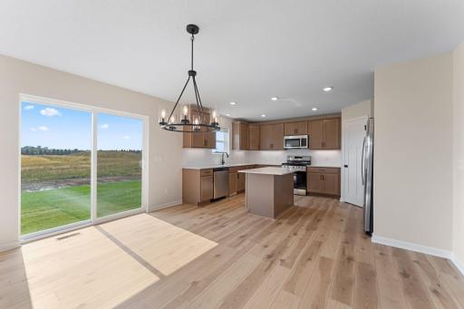 Kitchen with informal dining. Not actual but similar floorplan.