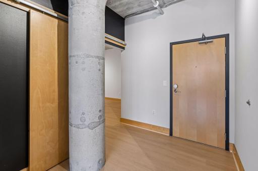 Foyer of unit 314 with entrance to second bedroom