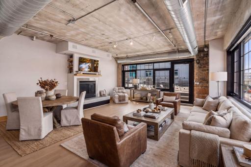 Virtual staging of large Living and Dining room showing the expansive space and options for placement of furniture