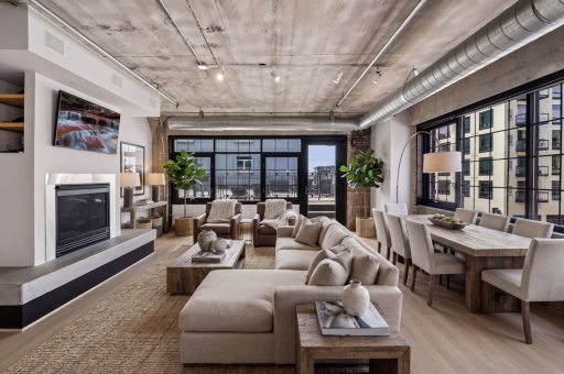 Virtual staging of large Living and Dining room showing the expansive space and options for placement of furniture