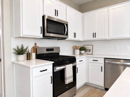 Stainless steel appliances throughout. *Photo of similar home. Virtually staged.