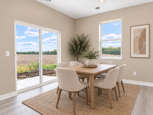 Sizeable dining room situated right off the 14x8 ft. patio out the back. *Photo of similar home. Virtually staged.