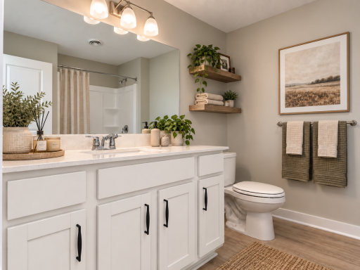 Upper level main full bathroom. *Photo of similar home. Virtually staged.