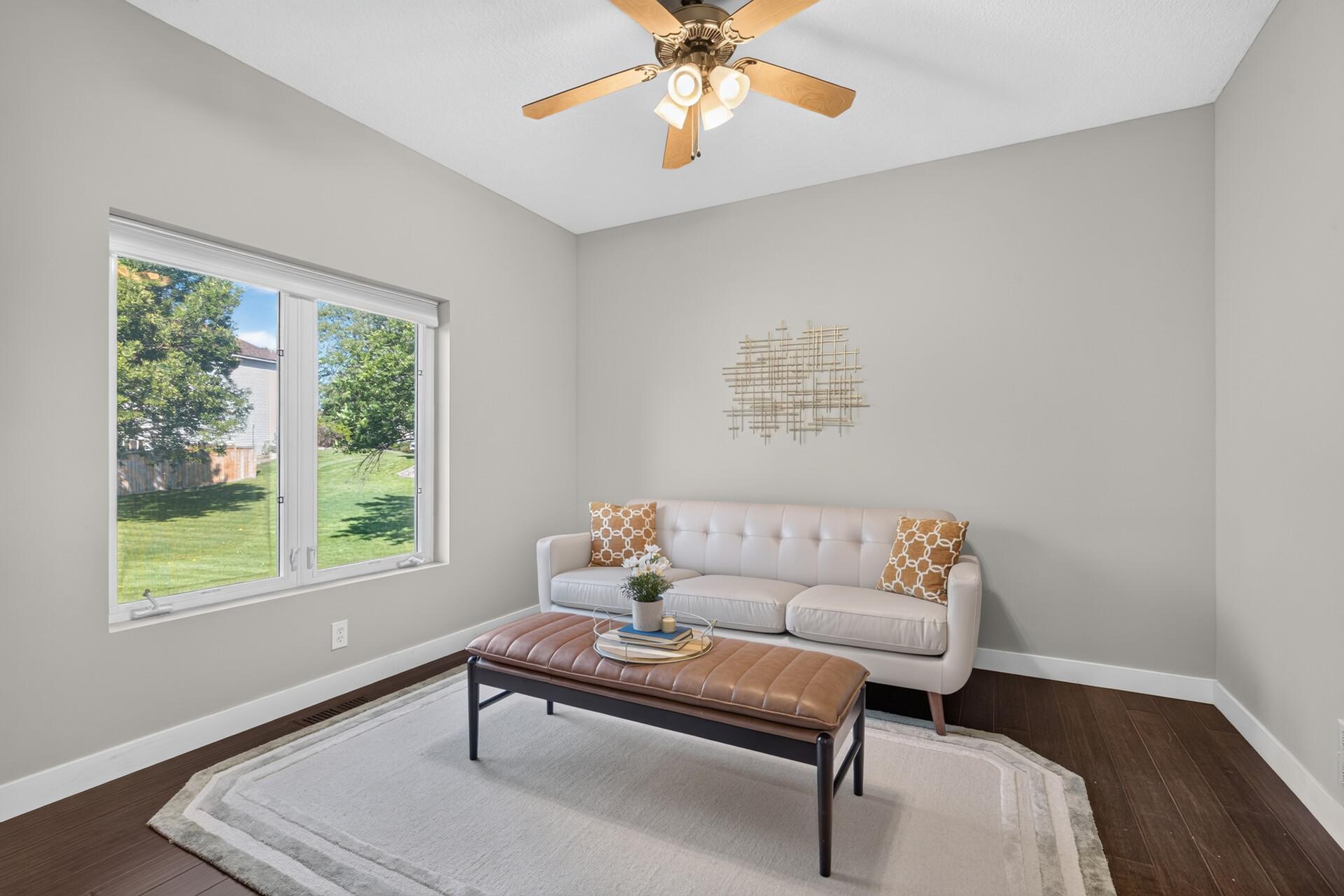 Flex room, can be an office, has a two-sided fireplace.