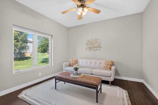 Flex room, can be an office, has a two-sided fireplace.
