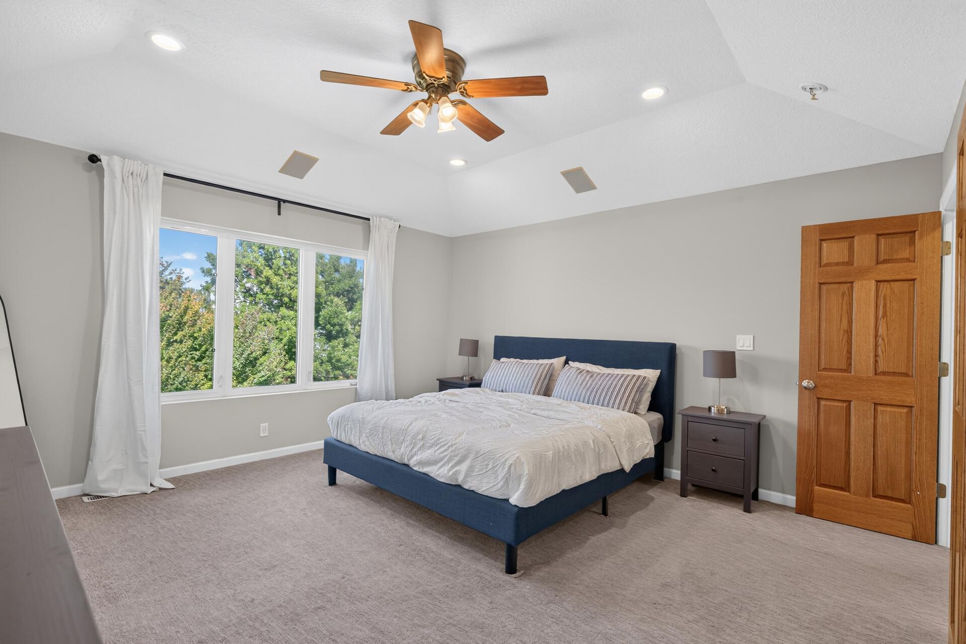 Another view of the primary bedroom.