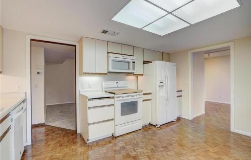 Beautiful wood floors extend throughout the main floor, adding warmth and continuity.