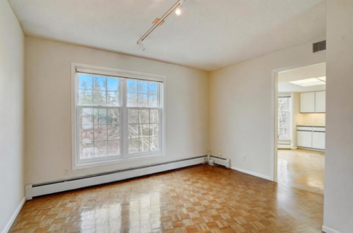 Formal dining room with direct access to the kitchen for easy serving and entertaining.