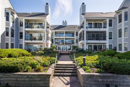 Back of the building positioned to capture lovely views of Excelsior Bay and the surrounding shoreline.