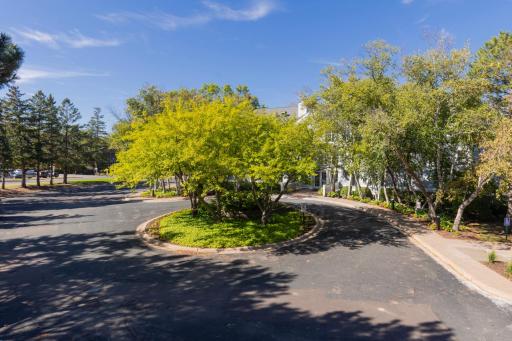 Circular driveway with plenty of guest parking.