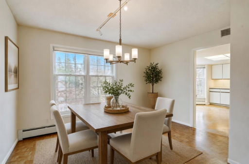 Virtually Staged - Formal dining room with direct access to the kitchen for easy serving and entertaining.