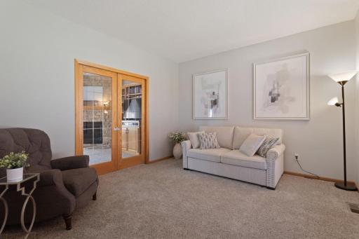 Enter the Living Room from the beveled glass doors.