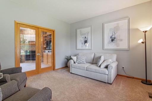 The Living Room features comfort and beauty as you can enter through the beveled glass doors from the Family Room.
