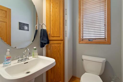 Main floor half bath right off the Mud Room and Kitchen.