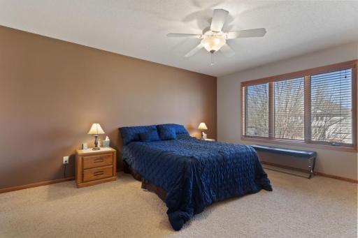 Primary suite has amazing view of the backyard - and can accommodate any sized furniture