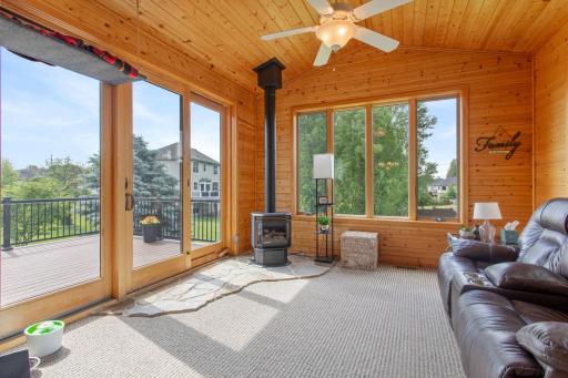Patio door to the maintenance free deck with stairs to the back yard.