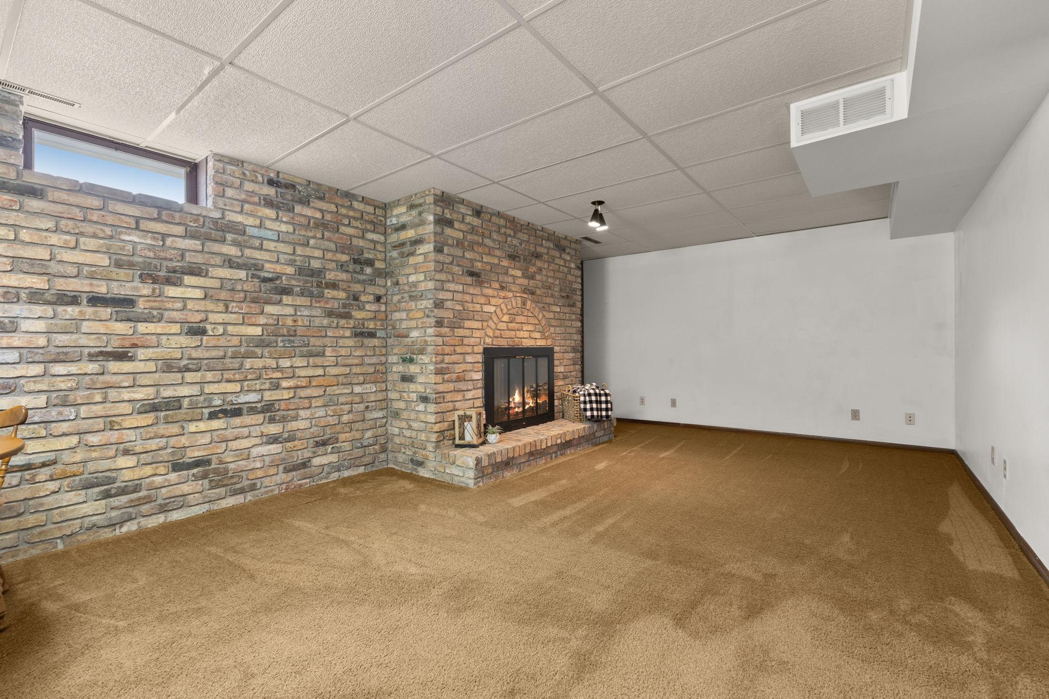 Check out the amazing brick fireplace!