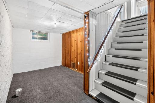 The lower level of this unit is a MASSIVE opportunity to dream big!
