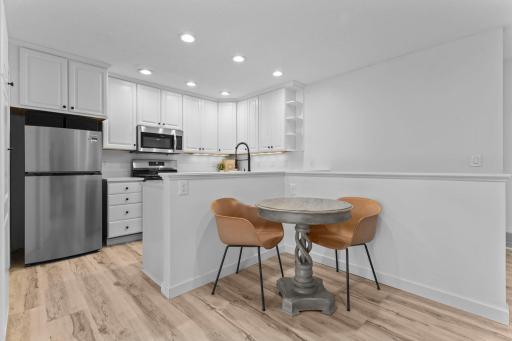 Eat in kitchen - plenty of room for a larger table in the open kitchen area