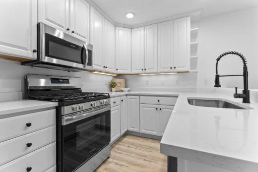 Ceiling height cabinets, stainless steel appliances