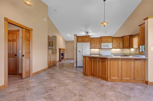 Entry Hall into kitchen with vaulted ceilings