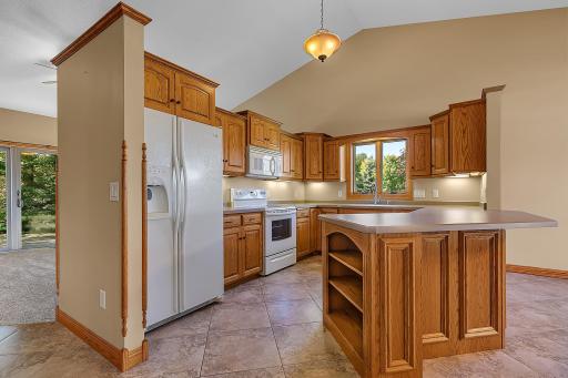 Kitchen counter peninsula with built in shelves