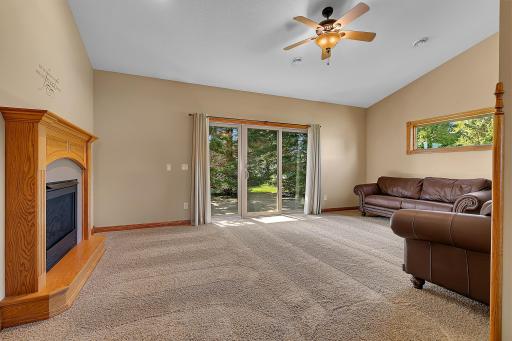 Living room with natural light from patio sliding doors.