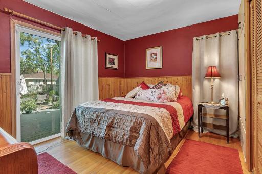 Primary bedroom with sliding door to deck
