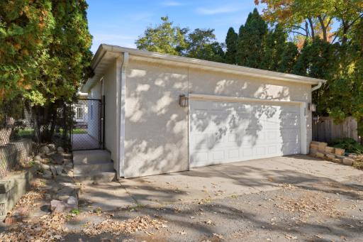 The oversized 2 car garage has space for lake toys and tools.